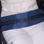 A tying-up belt for a wheelchair.